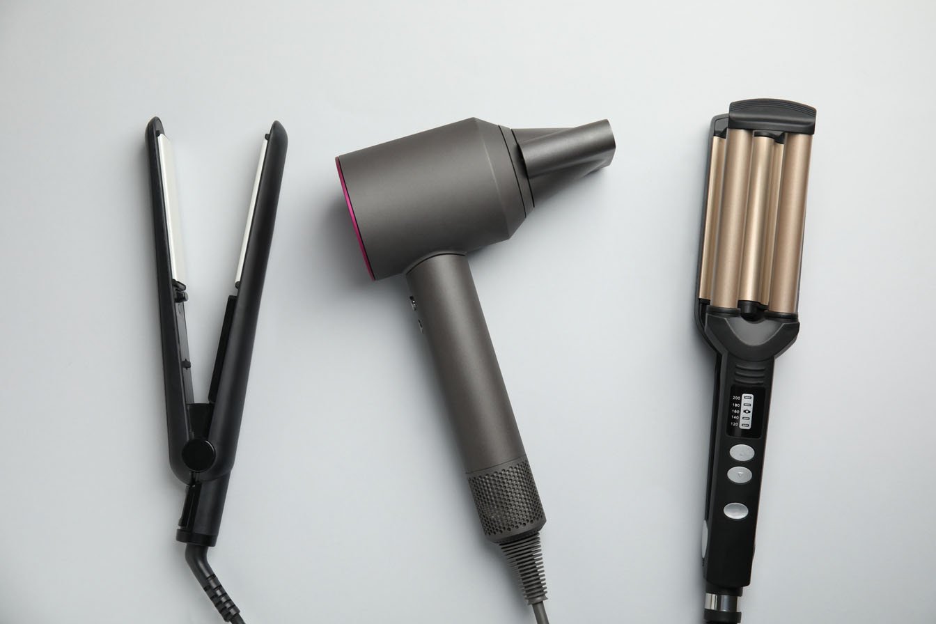 Professional hair styling tools used at Shimmerz